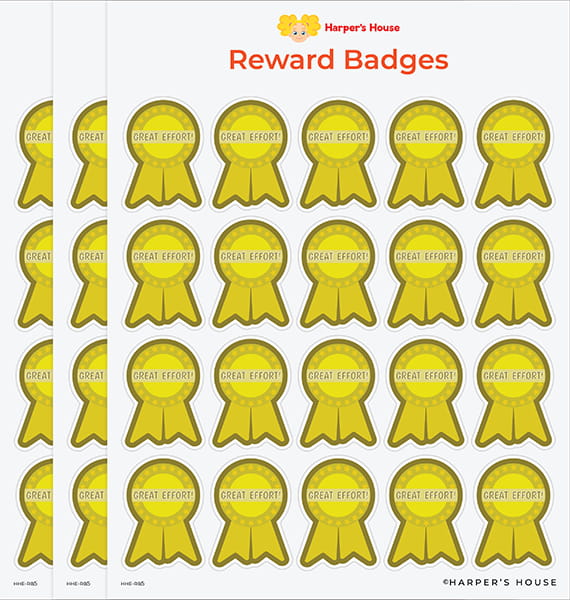stack of yellow reward badge stickers